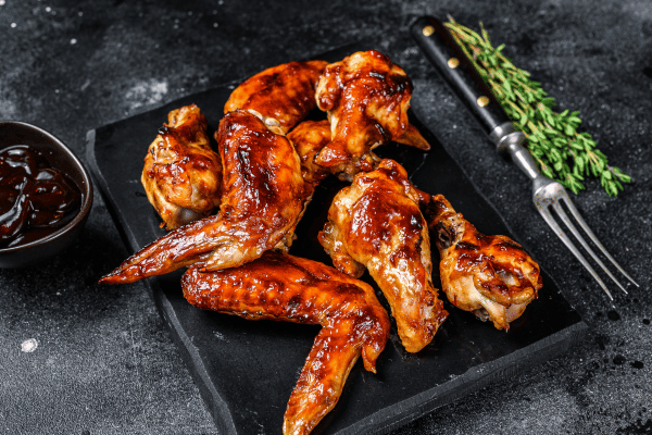 Carolina Gold BBQ: Everything You Need to Know 3 Juicy chicken wings glazed in flavorful BBQ sauce.