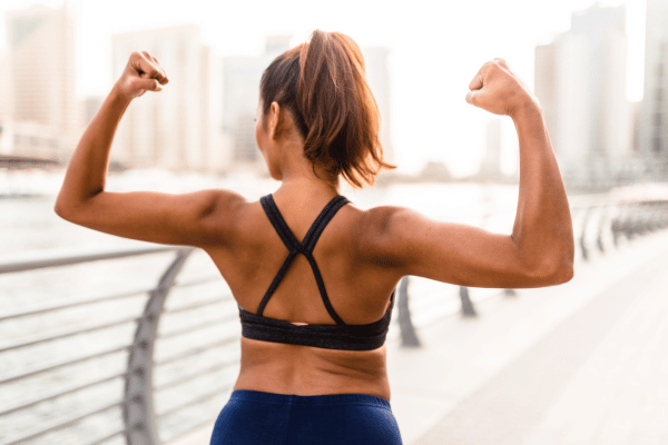 10 Surplus Diet Ideas for a Healthy Lifestyle 4 Woman Showing the Muscle.