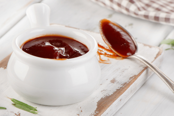 Carolina Gold BBQ: Everything You Need to Know 6 White jar holds golden Carolina BBQ sauce treasure.