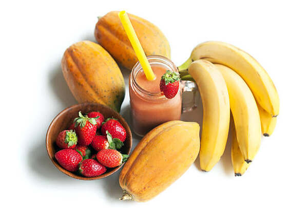 Does Banana Have Gluten? Here's What You Need to Know! 10 Banana papaya strawberry smoothie in a mason jar