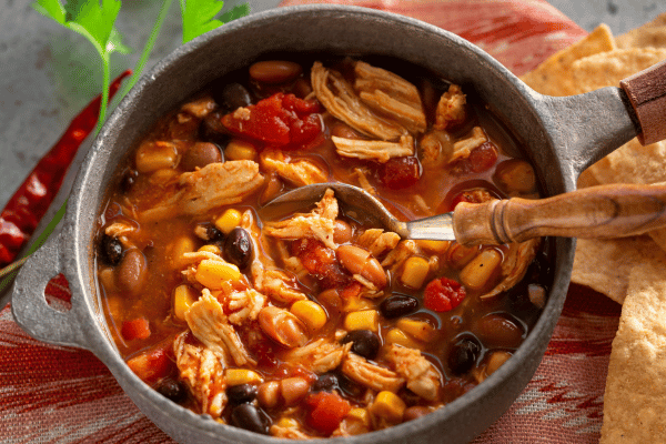 Keto Taco Soup Recipe: The Perfect Low Carb Comfort Food 9 Homemade chicken taco soup in a rustic pot.