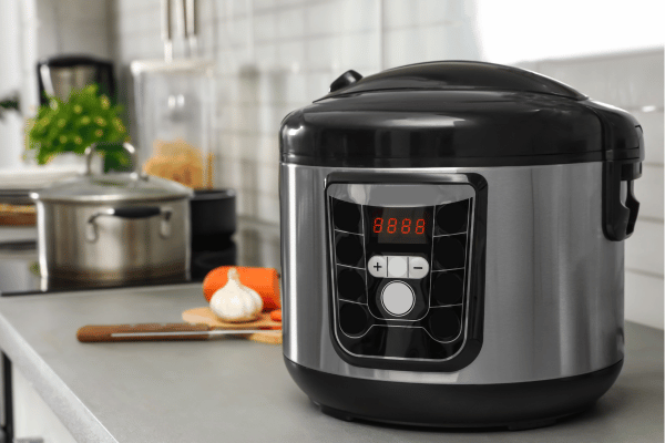 The Best Pork Cube Steak Recipe Using Slow Cooker 4 Modern multi cooker on a table in the kitchen.