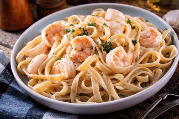 5 Keto Shrimp Recipes: Quick & Easy Dishes You'll Love 6 Keto Shrimp Recipes: A Plate of Delicious Shrimp Alfredo.