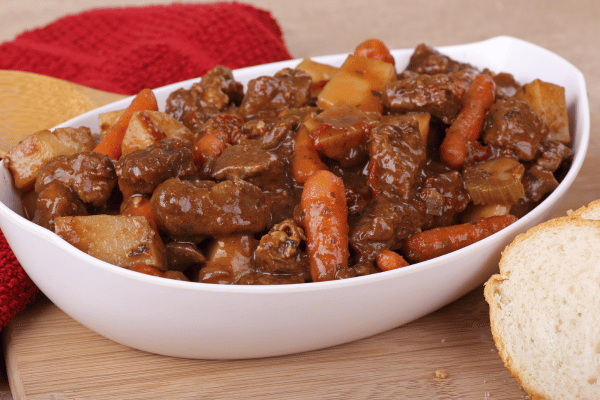Beef Stew Calories Made Easy: Tips for a Yummy Meal 6 A plate bowl of beef stew with carrots and potatoes.