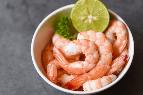 Keto Shrimp Scampi: Quick, Easy, & Low-Carb Recipe 8 A tantalizing bowl of zesty cooked shrimp, brimming with flavor and ready to delight your taste buds.