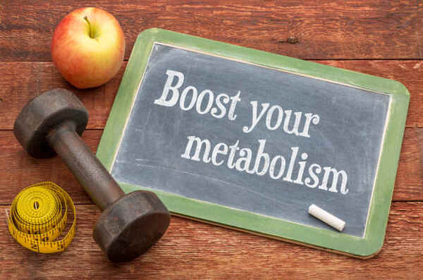 Top Thermic Foods to Boost Your Metabolism Naturally 12 A chalkboard sign with "Boost your metabolism" written