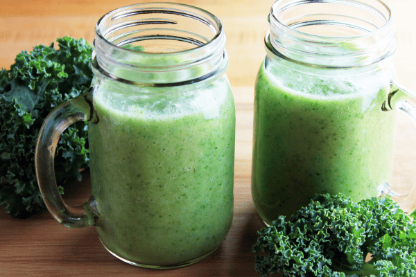 Low Carb Juicing: How to Make Tasty and Healthy Juices 17 Two jars of kale and cucumber juice.
