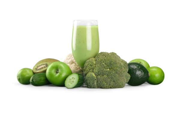 Low Carb Juicing: How to Make Tasty and Healthy Juices 2 A glass of green juice surrounded by fresh green vegetables and fruits.