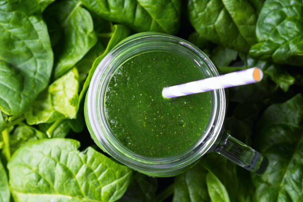 Low Carb Juicing: How to Make Tasty and Healthy Juices 8 Top view of Classic Green Juice with kale and cucumber.