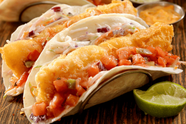 Keto Fish Tacos: The Ultimate Low Carb Recipe and Tips 9 Crispy fish tacos with creamy coleslaw and salsa.