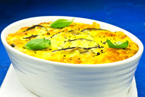 How to Make Keto Moussaka: A Step-by-Step Guide 8 Freshly baked moussaka served in a pristine white casserole dish.