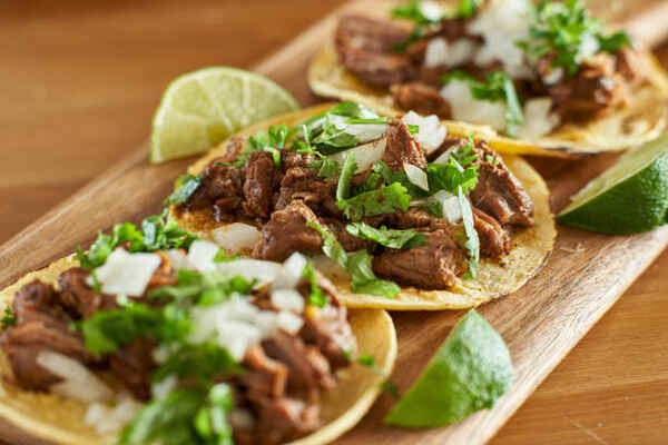 Trader Joe's Carne Asada: Perfect for Your Next Taco Night 6 Carne Asada tacos with veggies and limes