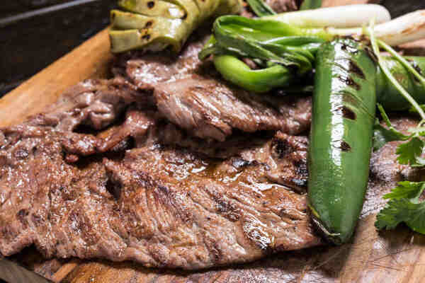 Trader Joe's Carne Asada: Perfect for Your Next Taco Night 2 Cooked Mexican carne asada with vegetables