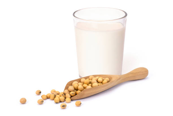 Is Soy Milk Keto? Everything You Need to Know 5 A glass of soy milk with soybeans