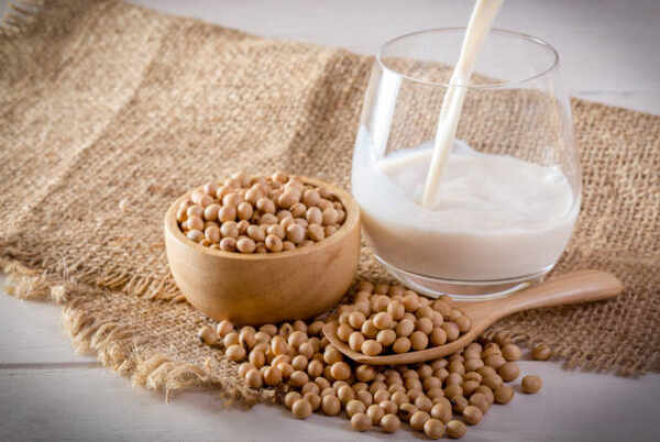 Is Soy Milk Keto? Everything You Need to Know 2 A glass of soya milk and a bowl of soya beans
