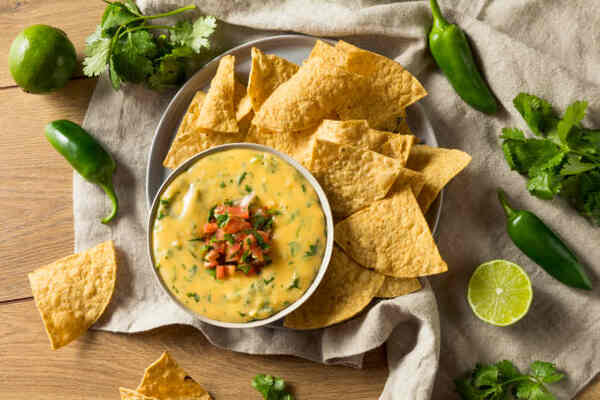 Low-Carb Tortilla Chips to Buy: Top Picks for Dieters 8 Tortilla chips served with spicy queso dip