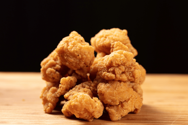 Cooking Dino Nuggets Air Fryer: Fun Variations and Tips 4 A pile of crispy, golden brown dino nuggets fresh from the air fryer, stacked up and ready to eat.