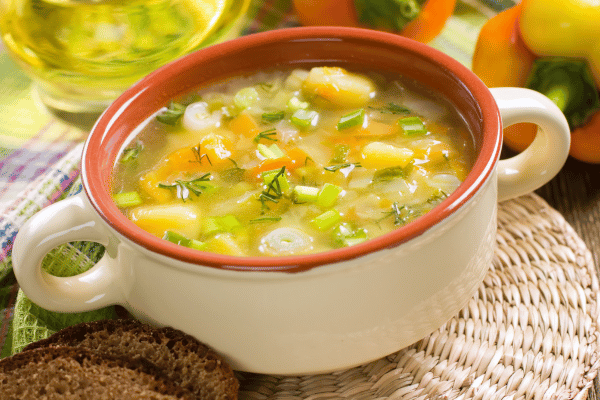 Keto Vegetable Soup: The Ultimate Low-Carb Option for Every Season 7 A beautiful bowl of keto vegetable soup, brimming with fresh, colorful veggies and a rich, clear broth.