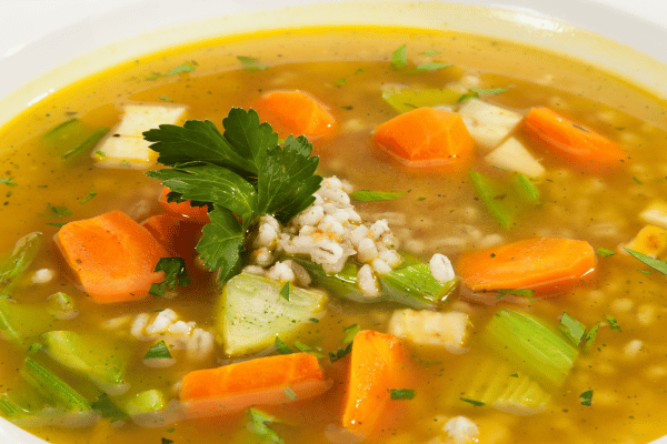 Keto Vegetable Soup: The Ultimate Low-Carb Option for Every Season 9 A close-up of keto vegetable soup, showcasing a vibrant array of vegetables arranged beautifully on top.