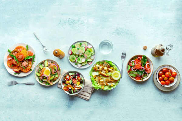 Easy Cheeseburger Salad Recipe for Quick, Tasty Meals 11 Overhead view of various fresh salads in plates