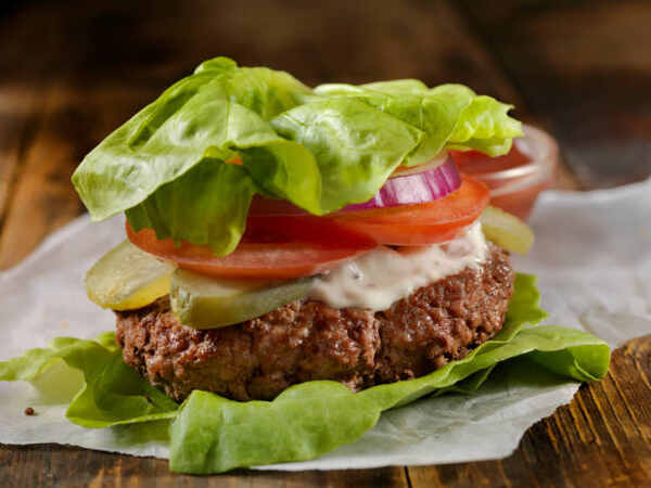 Easy Cheeseburger Salad Recipe for Quick, Tasty Meals 10 Lettuce wrap burger with pickles, tomato, and onions