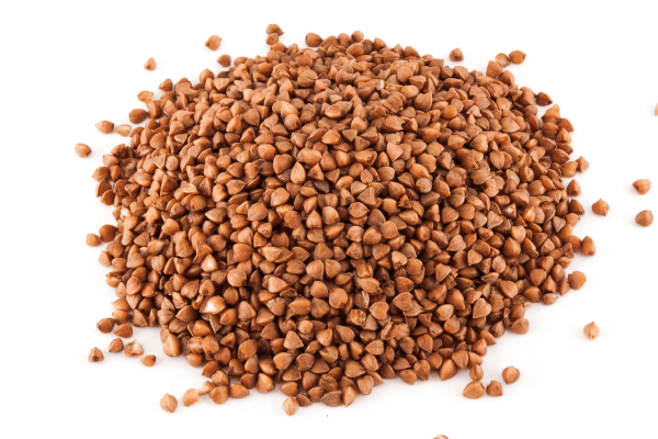 Is Buckwheat Keto Friendly? Everything You Need to Know 14 A small mountain of buckwheat grains rises gently, with its earthy brown and tan hues creating a textured, natural look.