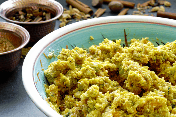 Is Falafel Keto Friendly? How to Make Low-Carb Versions 6 A close-up of fresh keto falafel ingredients in a bowl: ground almonds, herbs, garlic, and spices mixed together for a flavorful, low-carb falafel base.