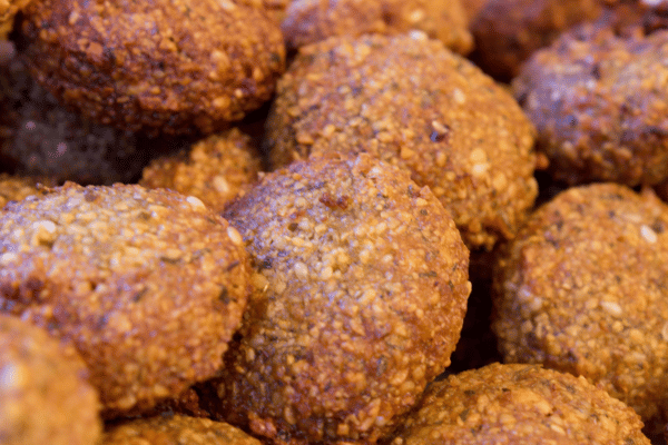 Is Falafel Keto Friendly? How to Make Low-Carb Versions 5 A close-up of crispy, golden-brown falafel, showing the perfectly fried outer layer with a crunchy texture and deliciously seasoned coating.