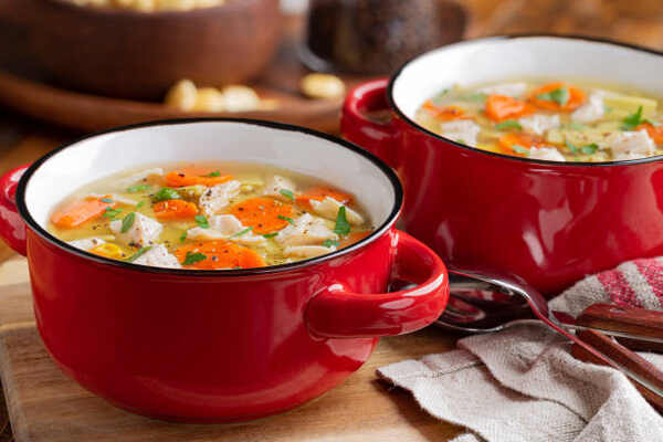 Hearty Keto Chicken Soup: Perfect Low-Carb Comfort Food 3 Classic chicken noodle soup in bowls