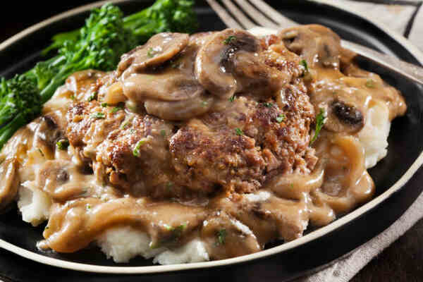 Flavorful Keto Steaks: Easy Recipes for Low-Carb Meals 7 Salisbury steak with mashed potato and mushroom gravy