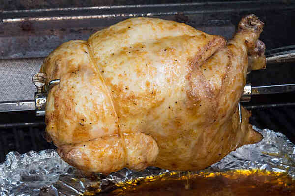 Easy Keto Turkey Gravy Perfect for Your Low-Carb Feast 3 Rotisserie chicken with drippings in an oven