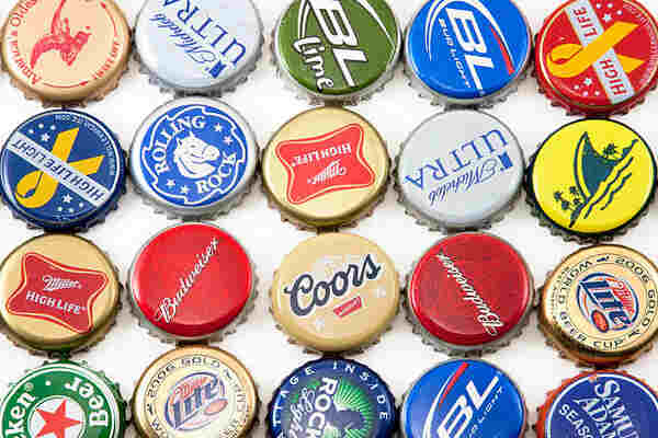 Caps of different beer bottles