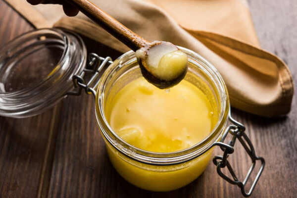 Is Butter a Carbohydrate? Truth About Its Nutritional Value 7 Clarified butter or ghee in a glass jar