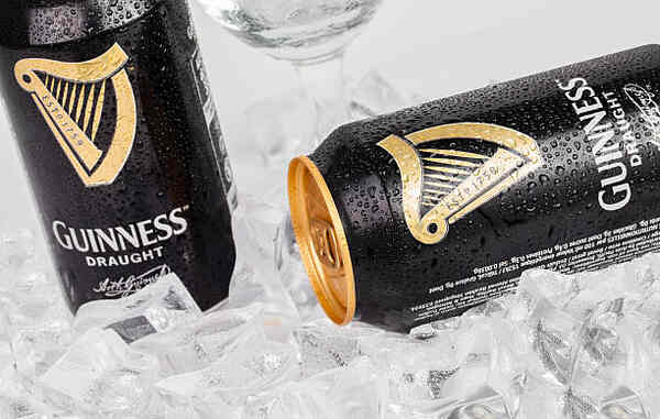 Guinness Draught in cans with ice cubes