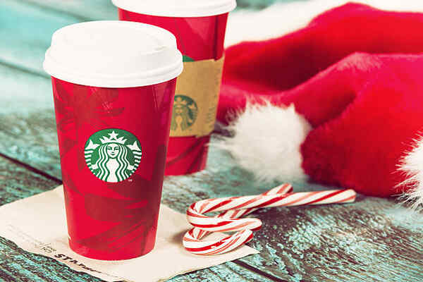 Starbucks Keto Hacks: Sip Your Way to Low-Carb Bliss 13 Seasonal Starbucks coffee cups with Christmas decorations