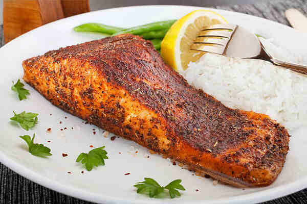 Keto at Applebee's 2025: Best Low-Carb Meals to Order 4 Blackened cajun salmon with rice and lemon slice