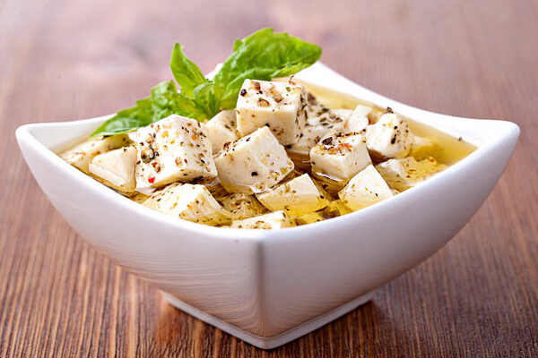 11 Healthy No-Carb Snacks to Satisfy Your Cravings 8 Spiced feta cheese cubes with olive oil