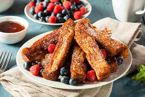 Easy Low-Carb French Toast Recipe for a Keto Breakfast 7 French toast sticks served with berries