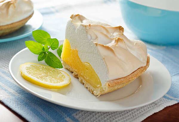 A slice of homemade lemon meringue pie 