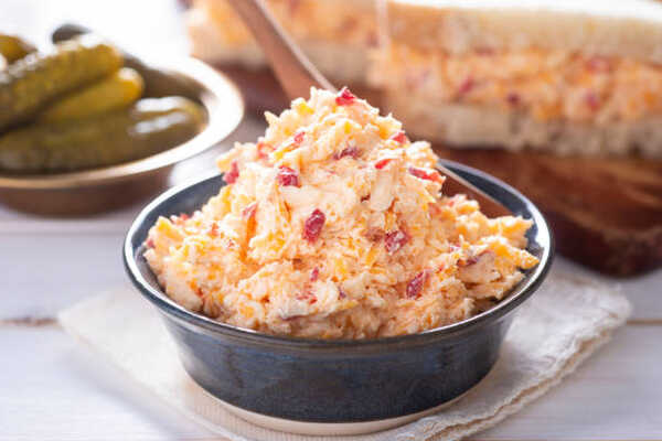 Easy Keto Pimento Cheese Recipe Ready in 10 Minutes 8 Homemade pimento cheese served in sandwiches with pickles