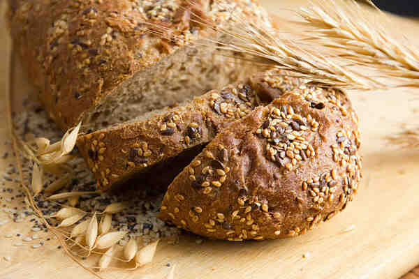 Easy High-Protein Bread Recipe You Can Make at Home 2 Homemade high-protein bread with sesame, flax, and poppy seeds