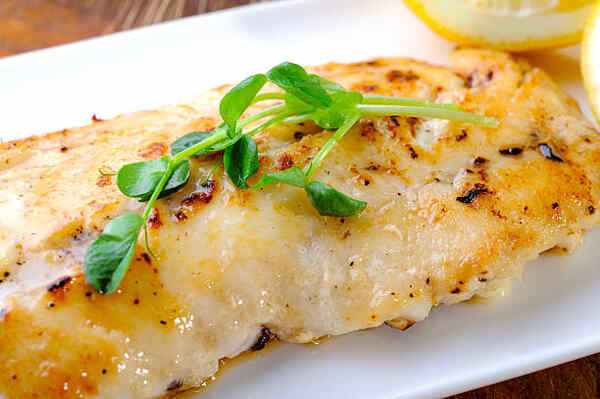 Easy Parmesan Crusted Cod Recipe for a Flavorful Meal 4 Baked cod fillet with lemon butter sauce