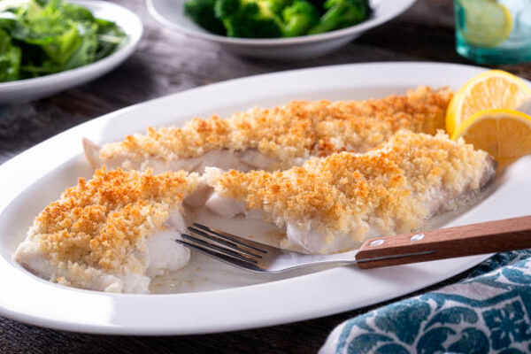 Easy Parmesan Crusted Cod Recipe for a Flavorful Meal 8 Baked crusted fish fillets with lemon
