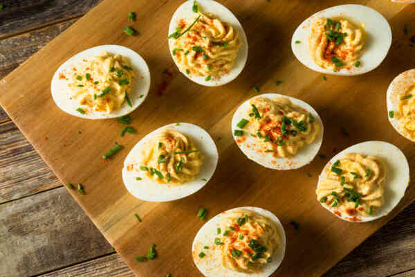 10 Quick and Easy Snacks With No Carbs to Curb Hunger 10 Deviled eggs topped with paprika and green onions