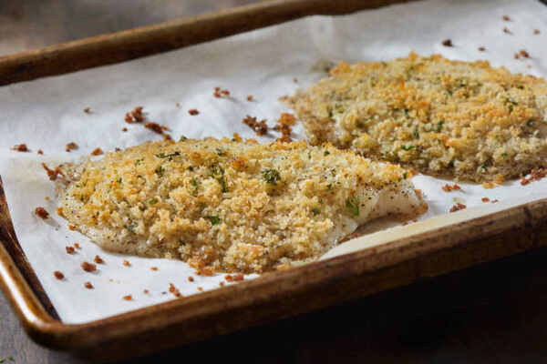 Easy Parmesan Crusted Cod Recipe for a Flavorful Meal 2 Baked parmesan-crusted fish on a baking sheet