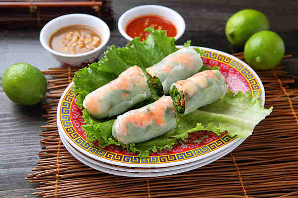 Keto Spring Rolls with Peanut Sauce You’ll Crave Daily 10 Fresh shrimp spring rolls served with dipping sauces and limes