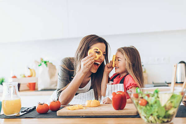 Keto for Picky Eaters: Family-Friendly Meal Ideas 6 Mother and daughter cooking with vegetables