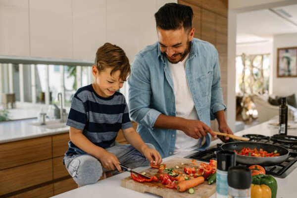 Keto for Picky Eaters: Family-Friendly Meal Ideas 7 Father and son preparing food in the kitchen