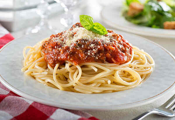 Easy Low-Carb Spaghetti Sauce Recipe for Keto Lovers 9 Spaghetti bolognese served with grated Parmesan cheese
