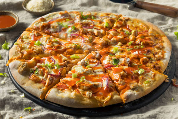 Easy Buffalo Chicken Pizza Recipe for Game Day Fun! 2 Homemade buffalo chicken pizza with blue cheese and tomato sauce